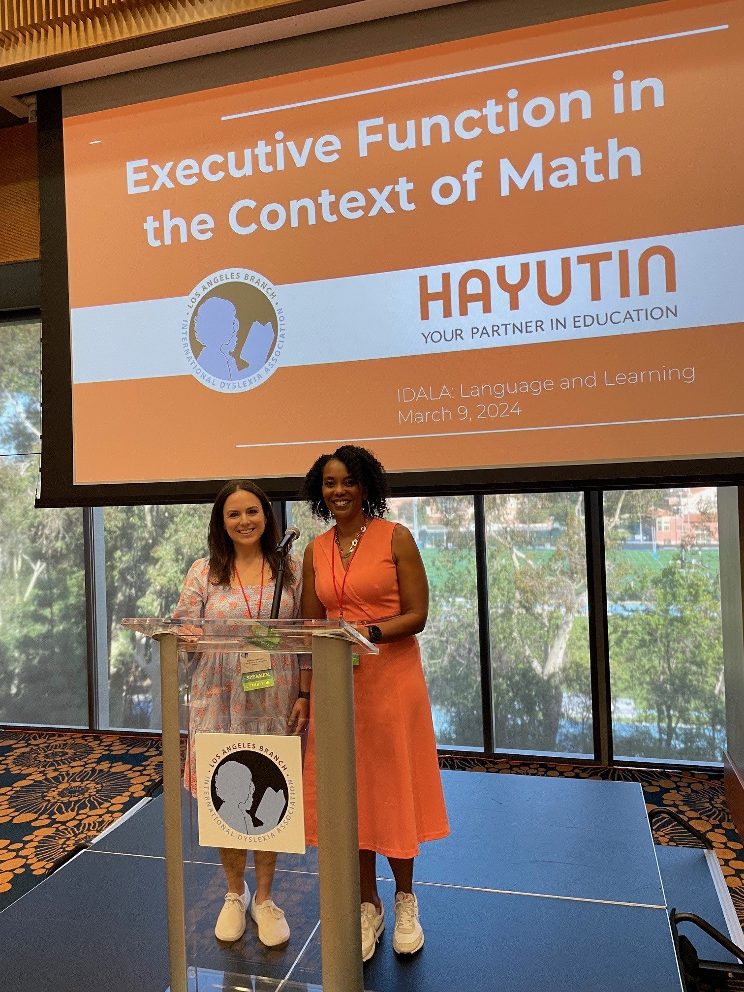 Courtney Wittner (Senior Director), and Jakell (Director) presenting at IDALA, 2024.